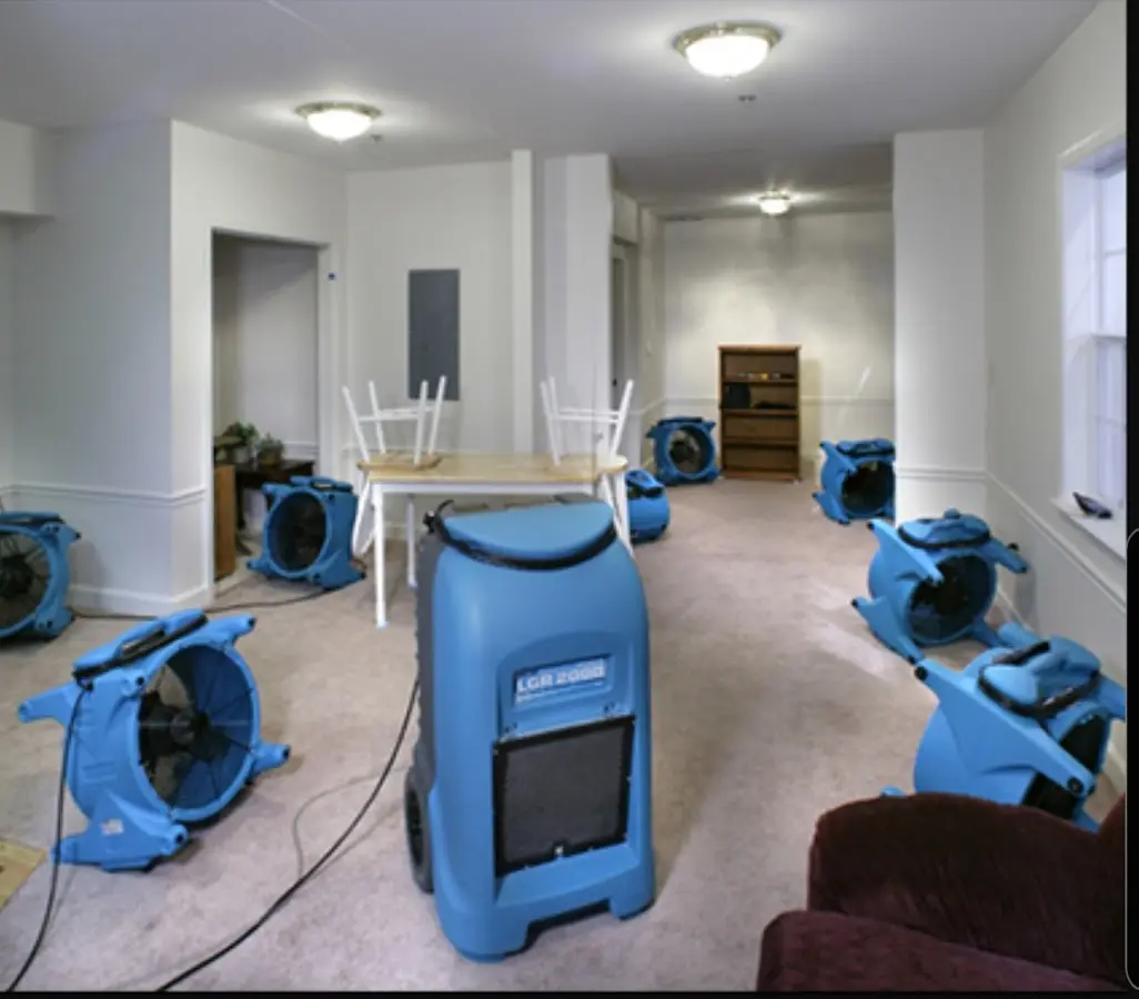 Air movers and dehumidifier setup for Water Damage Restoration in Coshocton
